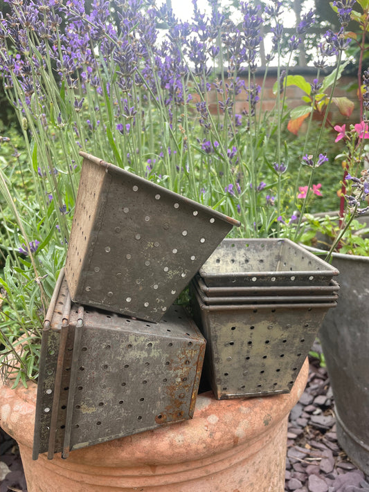 Old French metal cheese moulds
